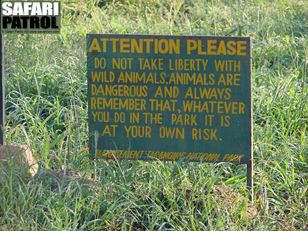 Varningsskylt. (Tarangire National Park, Tanzania)